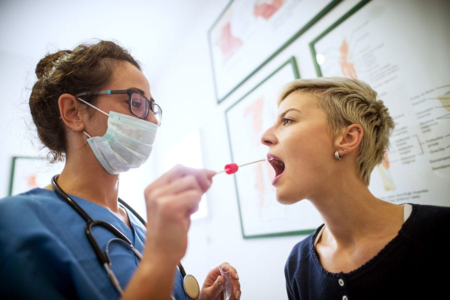 Woman getting a Flu Test in Dearborn MI